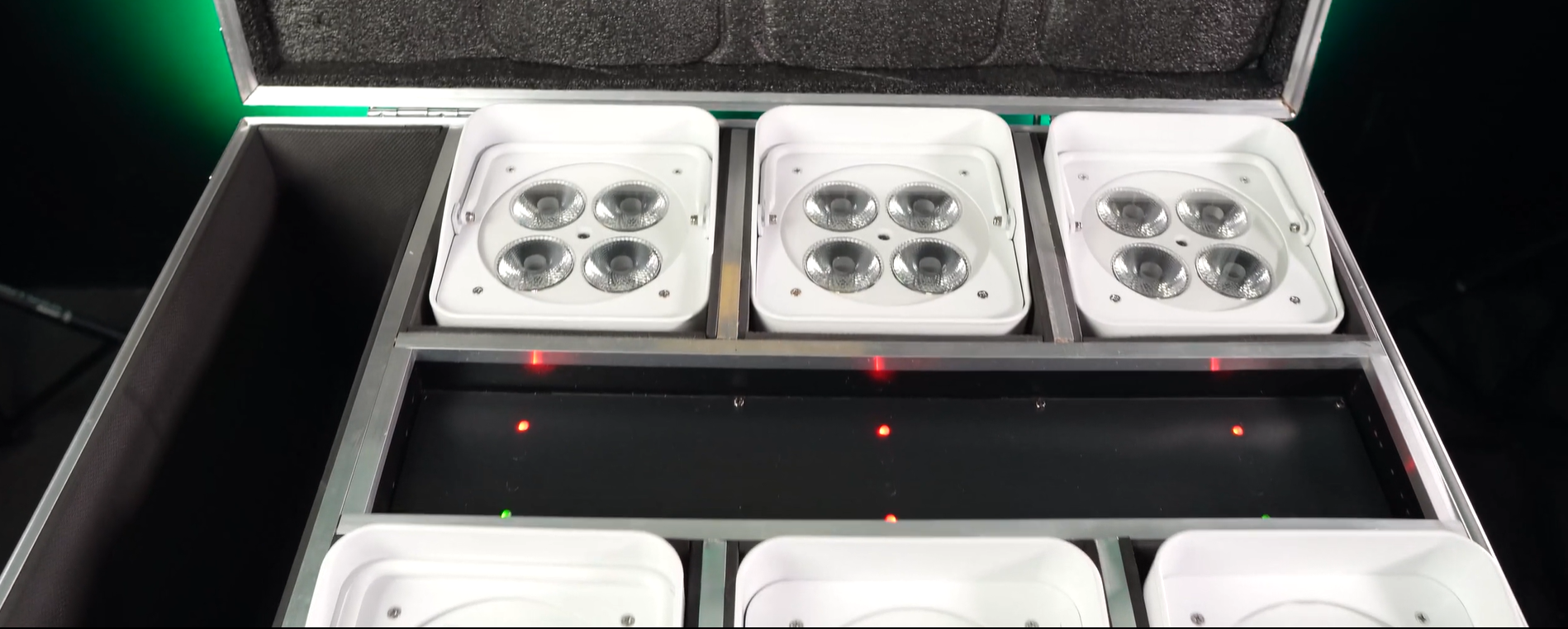 Lights in charging case with 2 rows of indicator LEDs; upper row all red, lower row green-red-green