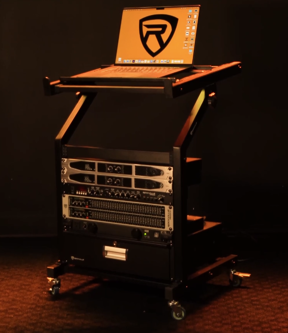 Assemble RL9MU with laptop open on top and audio gear in the rack below