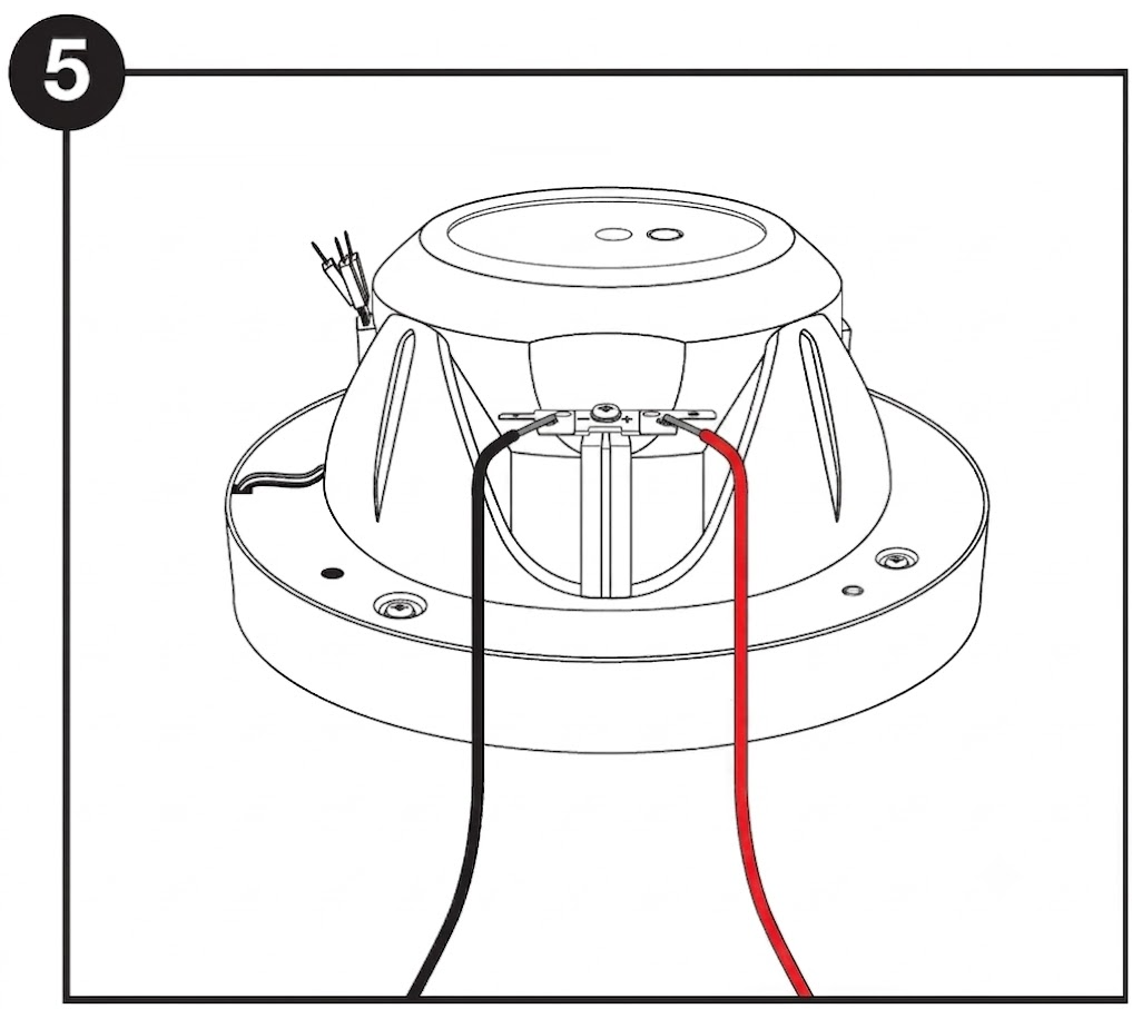 Line drawing step labeled with a circled "5" in the top-left corner, illustrating speaker wire connection:  Speaker Housing: Shows the back side of a round speaker body resting upside down on its front flange.  Wiring Connections: A black wire connects to the negative (-) spade terminal on the left side, and a red wire connects to the positive (+) spade terminal on the right side.  Additional Details: Additional small wire leads extend from the upper-left side of the magnet enclosure.
