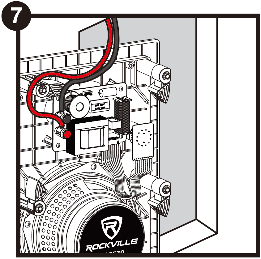 A line drawing labeled with the number 7 in the top-left corner, showing a close-up rear view of an in-wall speaker as it is prepared for mounting:  Speaker Rear Components: Displays the rear assembly of a Rockville speaker, including the crossover circuit board, transformer, mounting dog-leg clamps, and the main woofer magnet at the bottom.  Wiring Connections:  Red Wire (Positive): Connects into the lower terminal post with a red insert.  Black Wire (Negative): Connects into the upper terminal post with a black insert.  Wall Positioning: The speaker frame is tilted slightly outward from a rectangular cutout in the wall surface behind it, indicating wire attachment prior to inserting the speaker into the wall.